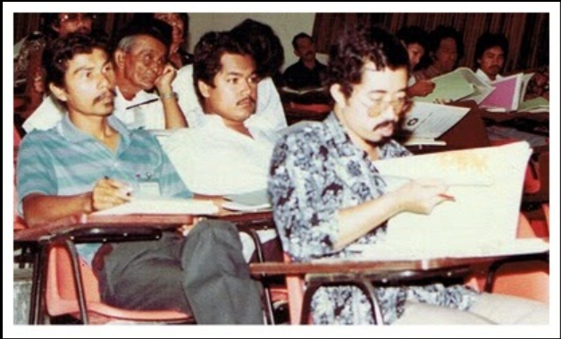 Three seated men listening to lecture on Boria - Seminar Boria 1983,