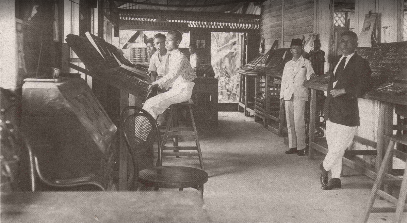 Workers in the process of publishing and printing the book.