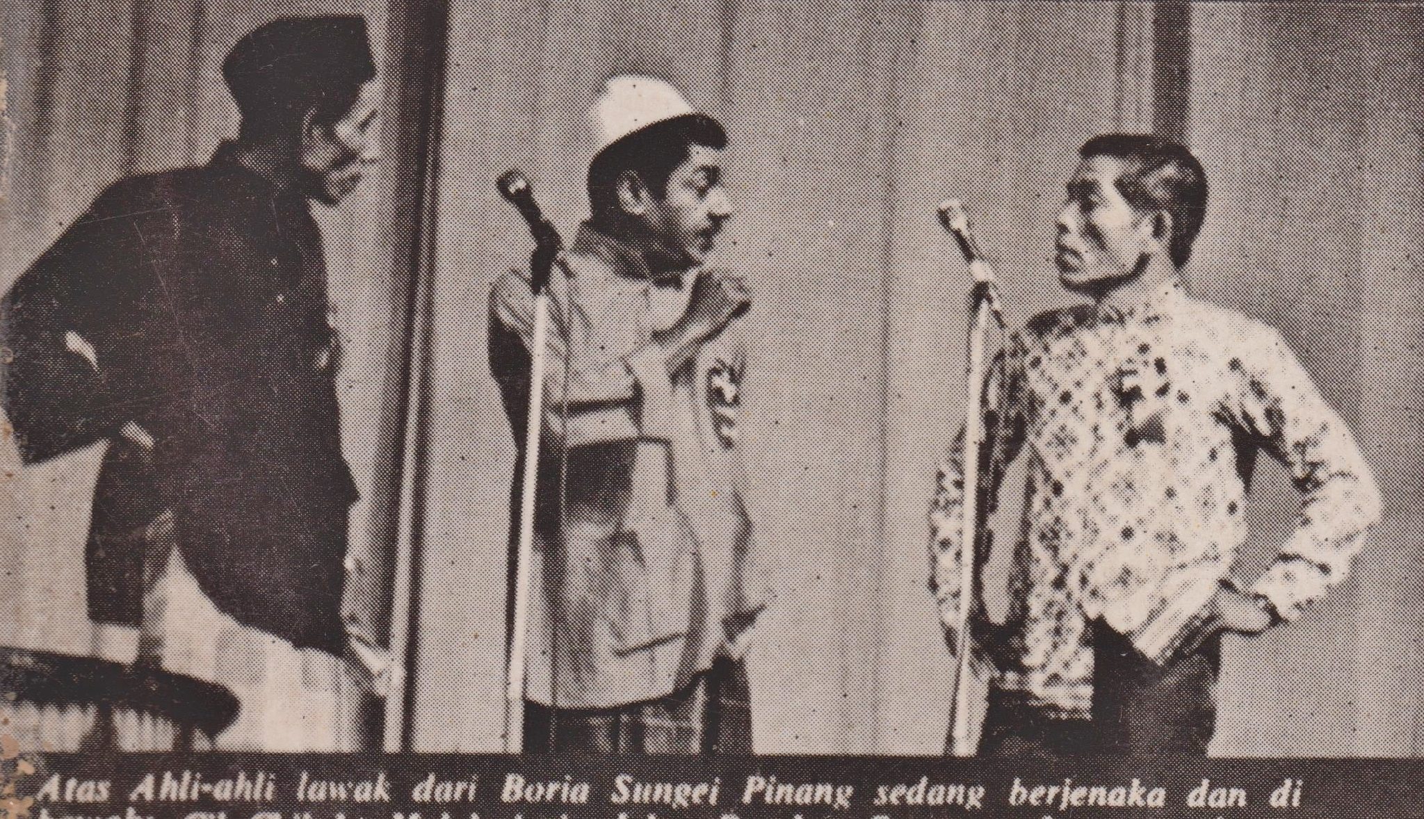 Boria singers on stage.