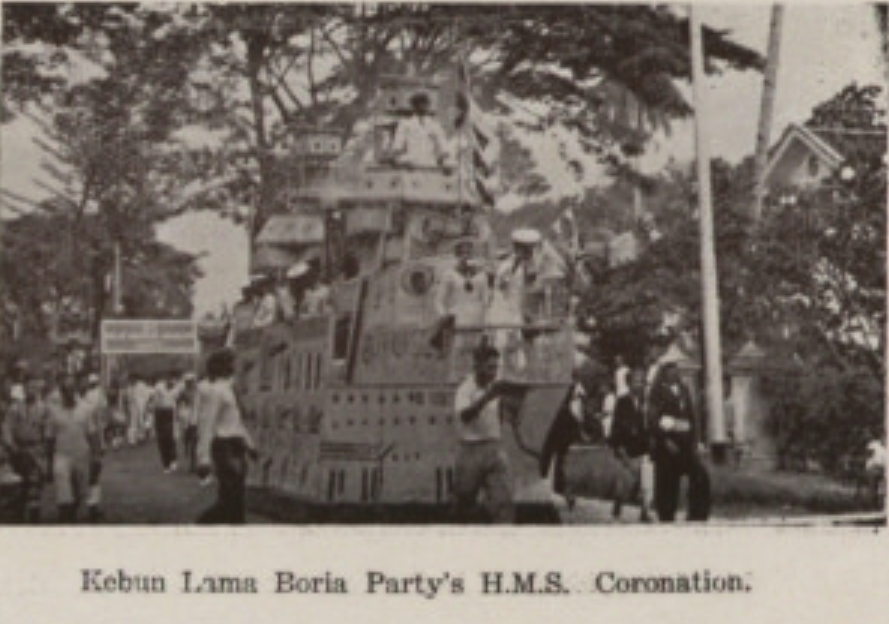 Parade float decorated as a boat called the HMS Coronation