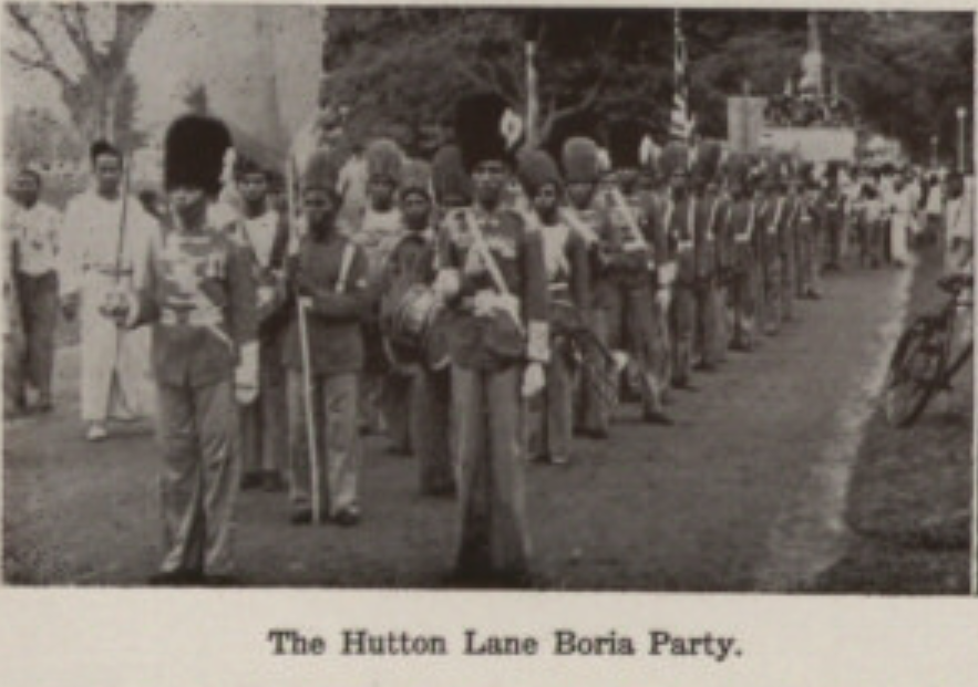 The party in uniform on parade.