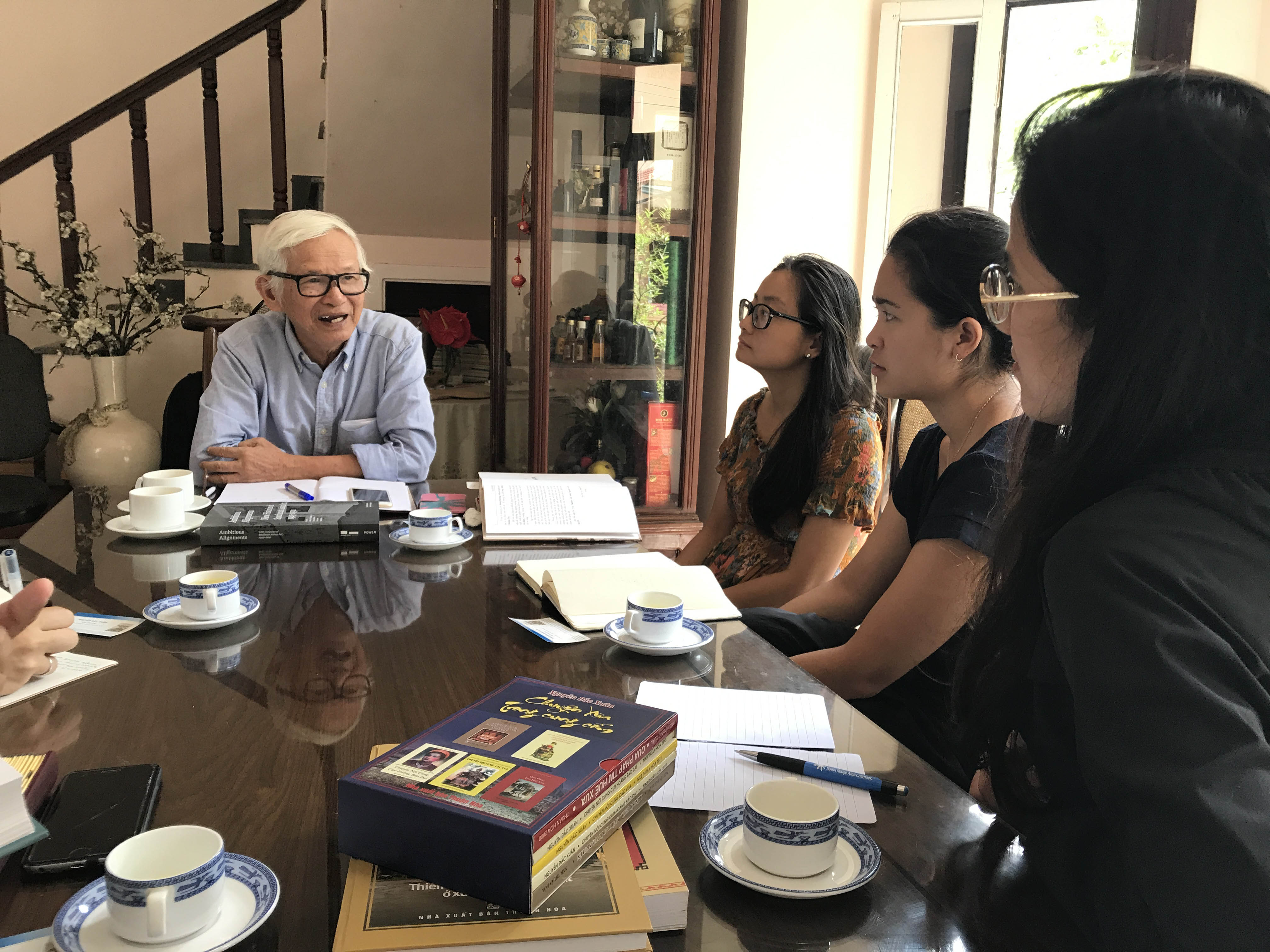 Site and Space participants with local expert at LOCATION during CITY fieldwork trip, YEAR. Photo: NAME.