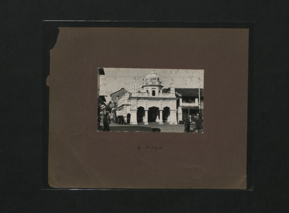 A small black-and-white photo of the shrine. It is within a frame.