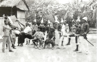 Boria performers at Kampong Deli and the bridge at the junction of Pinang and Burmah Roads (Titi Papan).