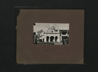 A small black-and-white photo of the shrine. It is within a frame.