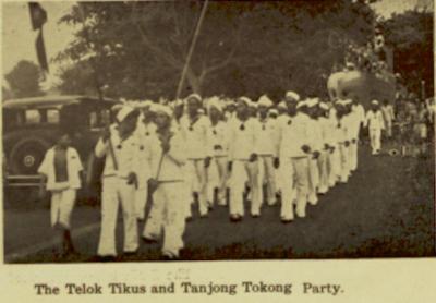 The Telok Tikus and Tanjong Tokong parties in a procession.