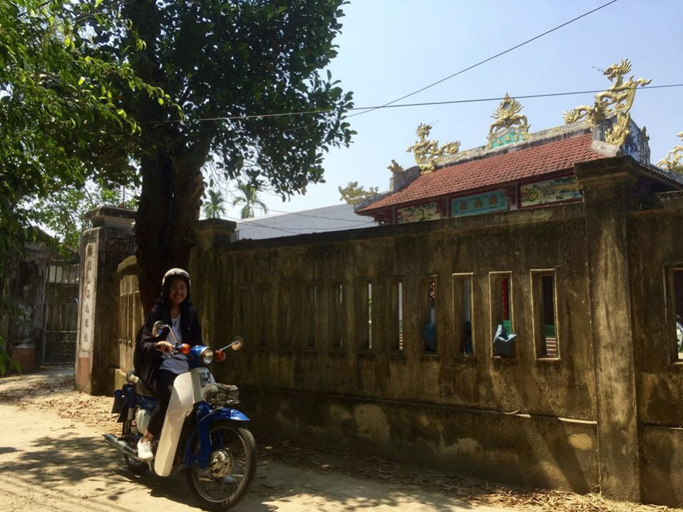 Phi Nguyen on an Old Honda Cub motorbike